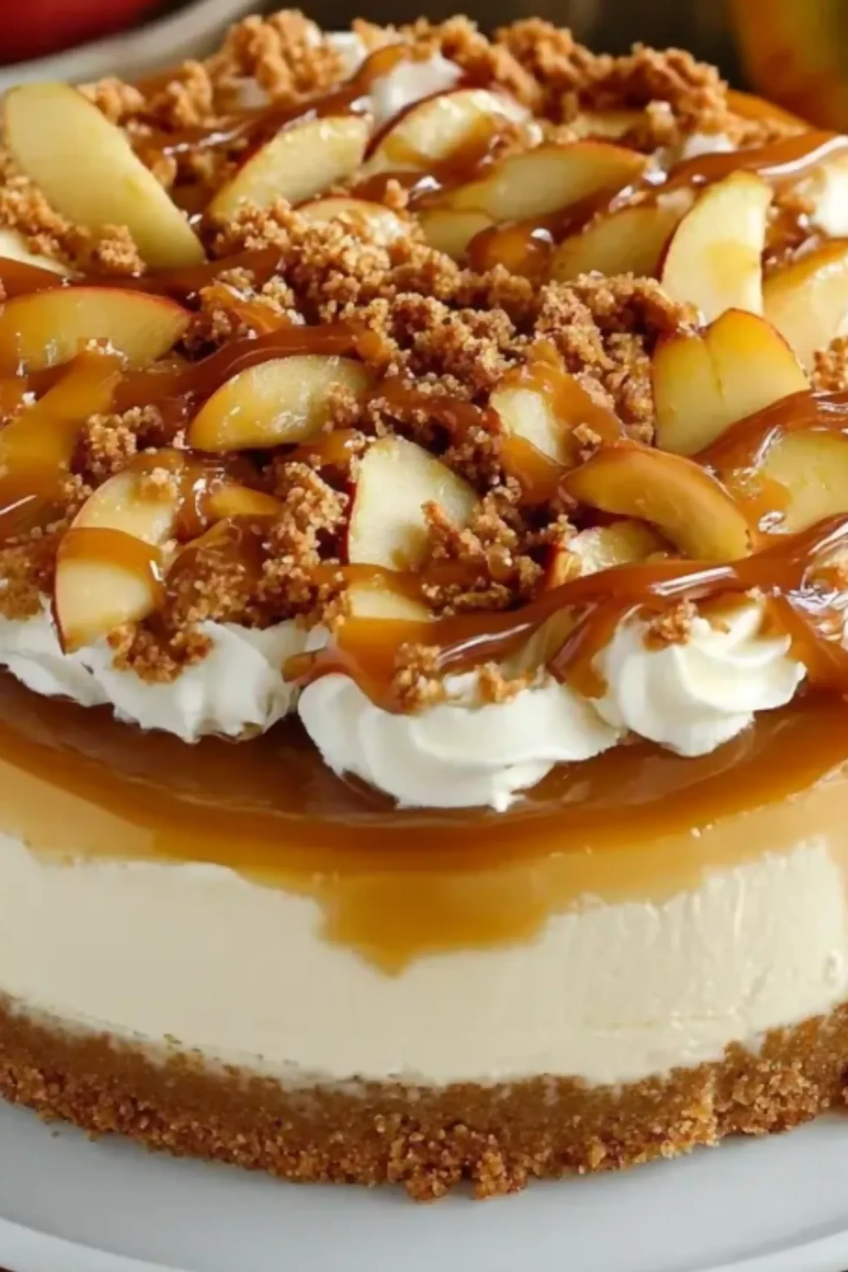 Caramel Apple Cheesecake topped with golden caramel drizzle