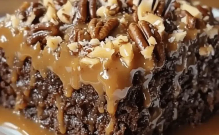 Moist German Chocolate Poke Cake topped with coconut-pecan frosting