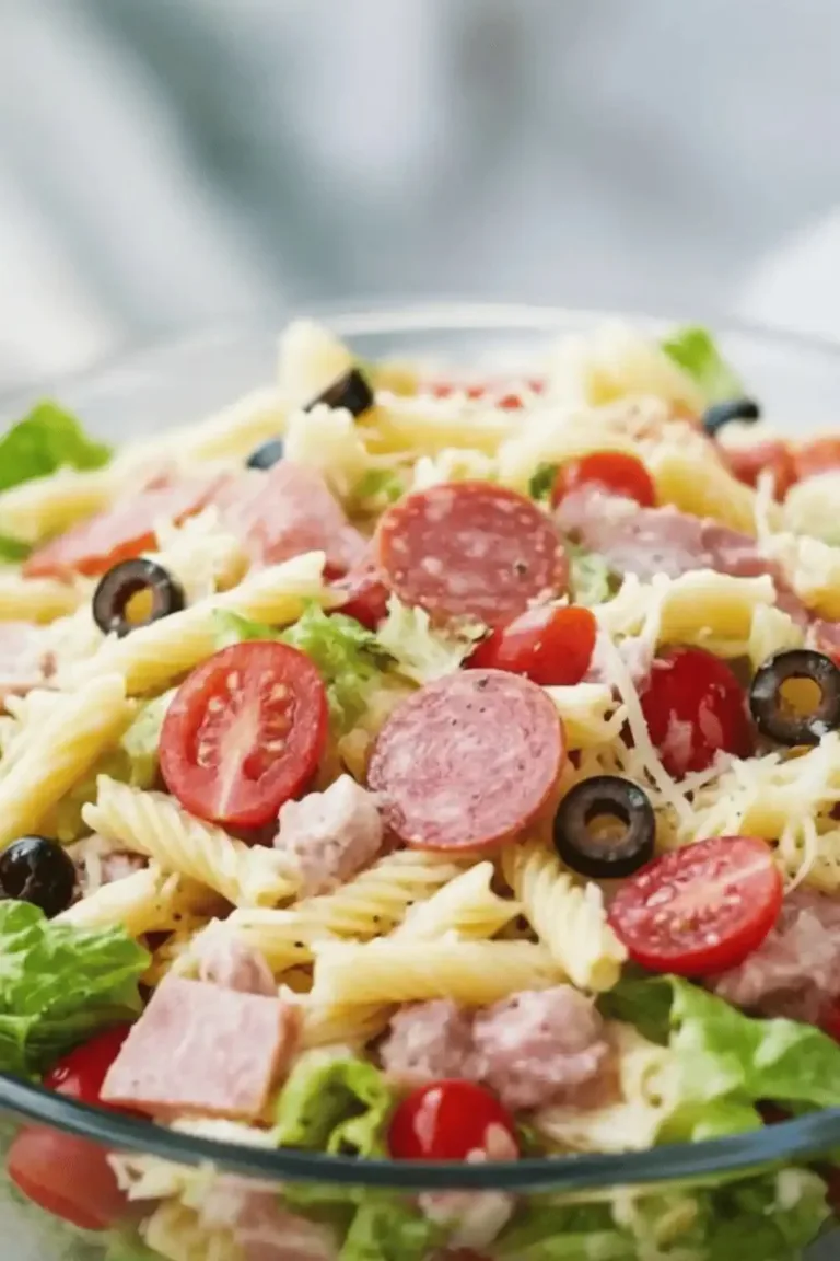 Colorful Italian Grinder Pasta Salad with fresh vegetables and dressing.