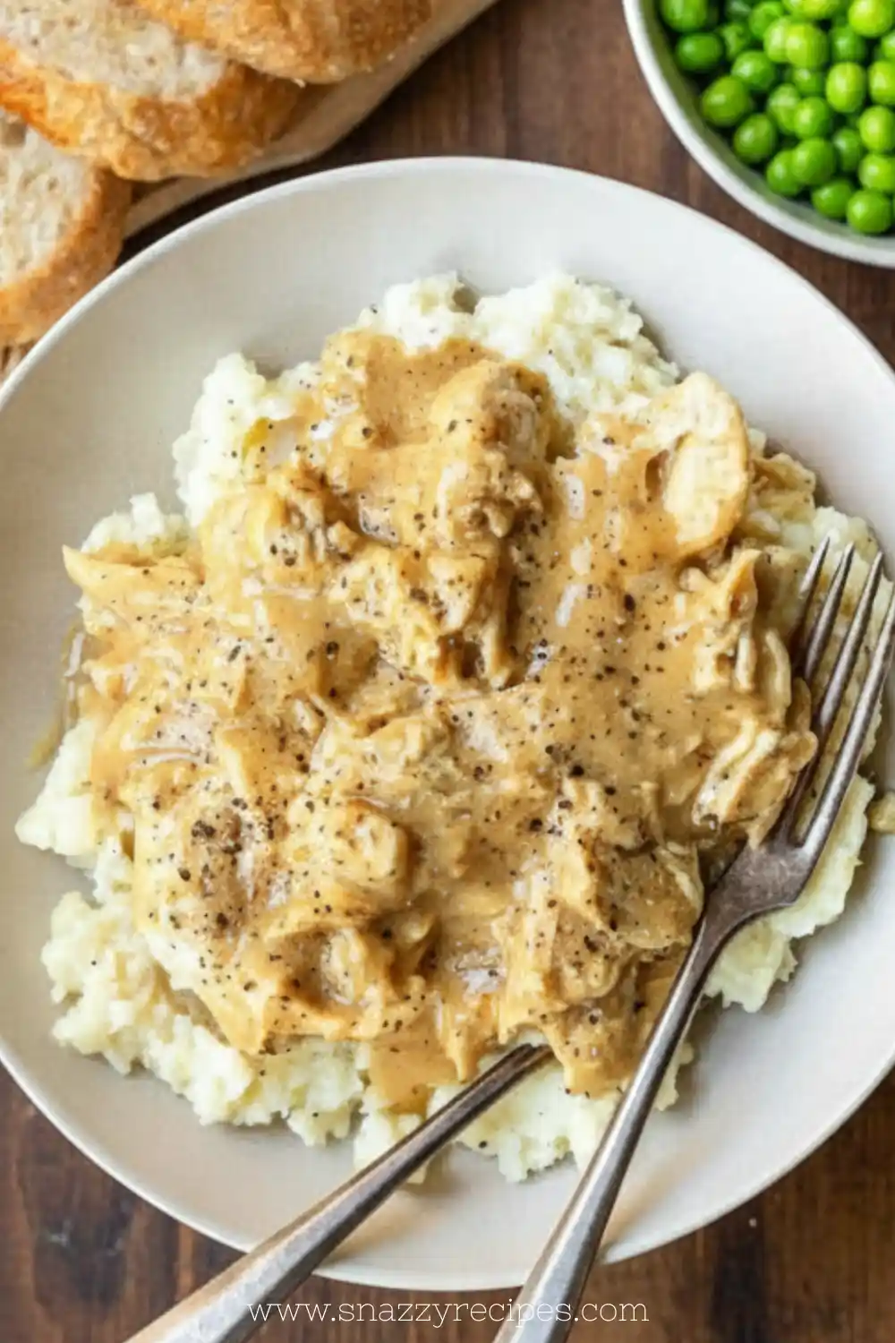 Delicious homestyle chicken and gravy served on a plate with mashed potatoes.