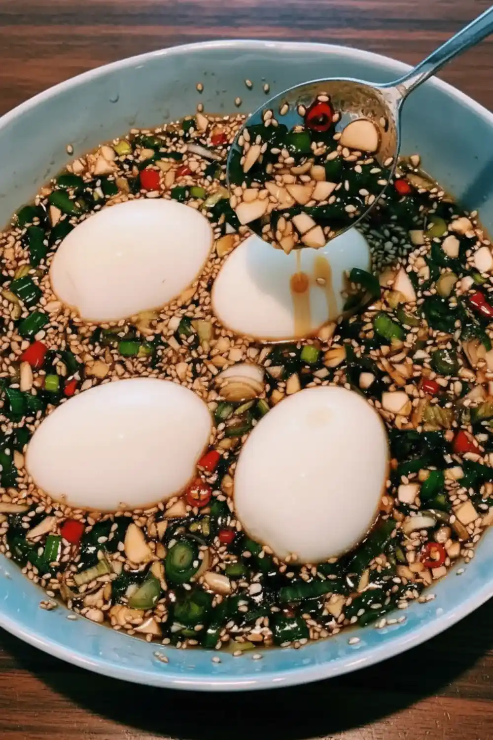 Delicious Korean marinated eggs served on a plate, showcasing vibrant colors.