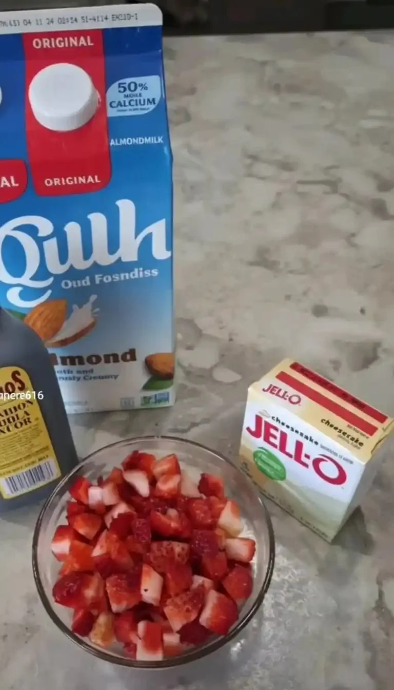 Overnight oats with strawberries and Greek yogurt in a glass bowl