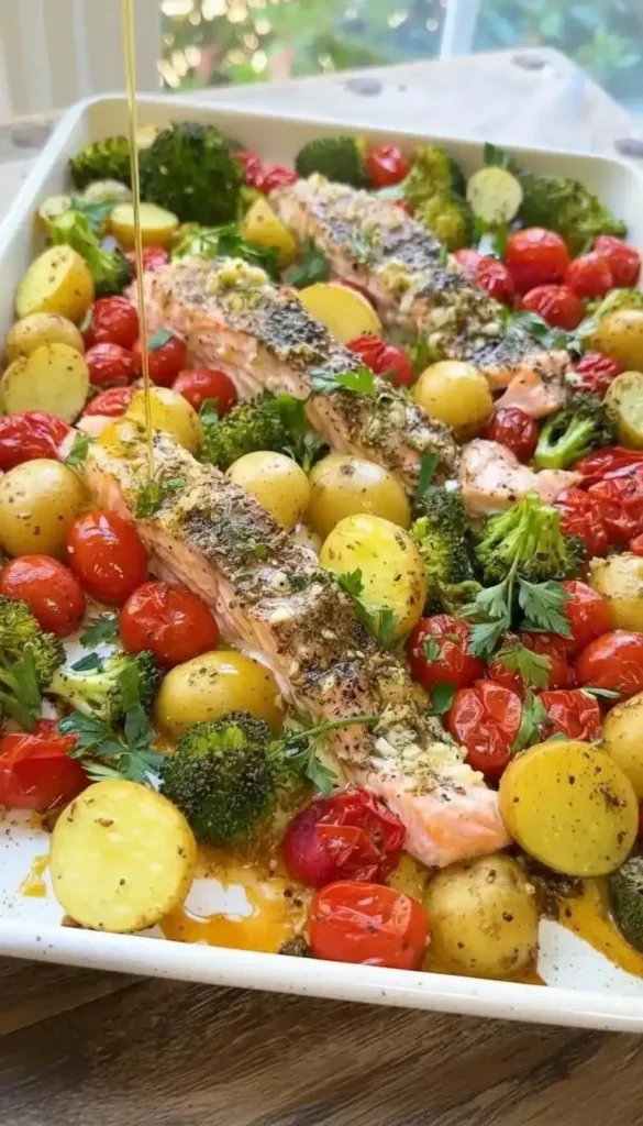 Sheet pan salmon with colorful vegetables cooked to perfection