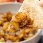 Delicious Apple Pie Dip served with crispy apple slices and caramel sauce.
