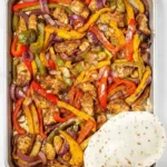 Delicious sheet pan chicken fajitas with vibrant vegetables and spices
